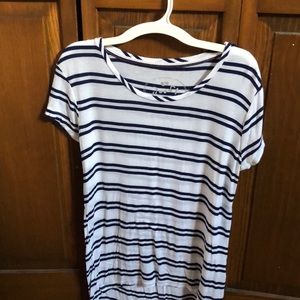 Short sleeves navy blue and white stripped shirt.